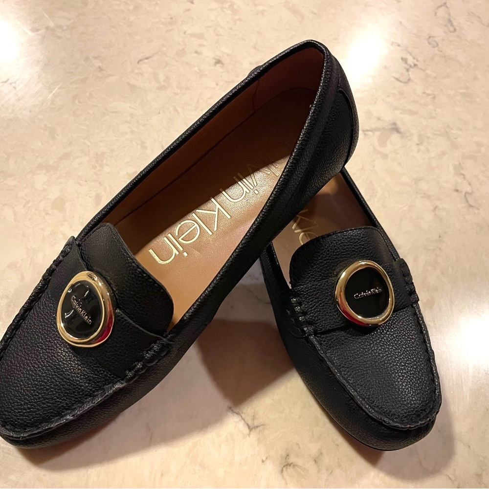 Calvin Klein Black Leather Loafers with Gold Ornament